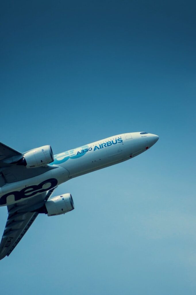 a large commercial airplane flying in the sky